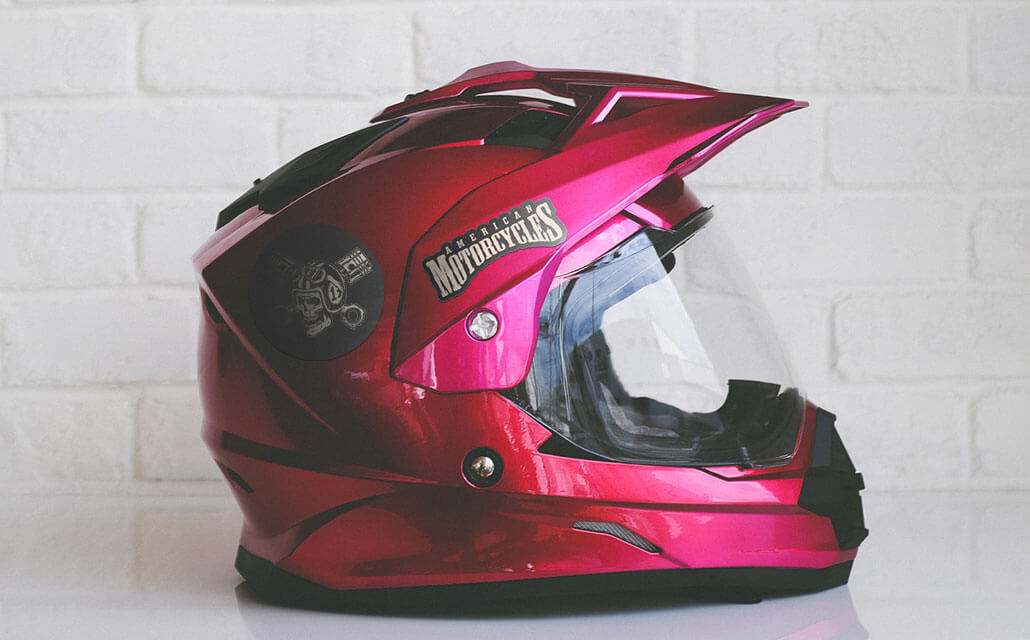 Motorcycle helmet with logo stickers on it.