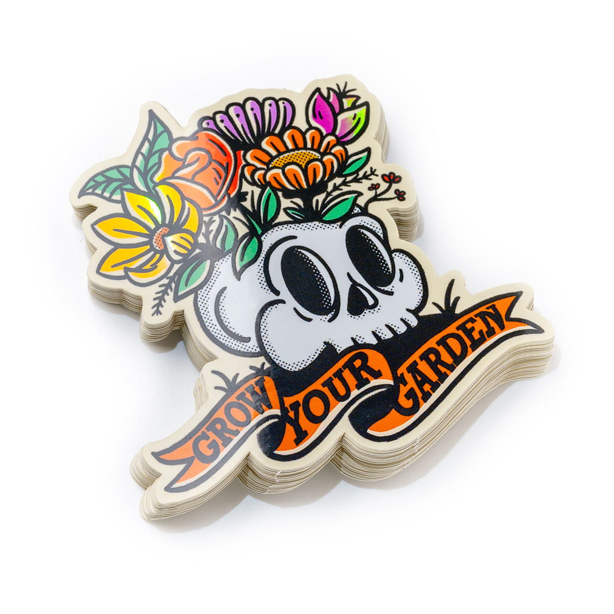 Aufkleber mit einem Totenkopf mit bunten Blumen oben und dem Text "Grow Your Garden" in fetten Buchstaben unten.