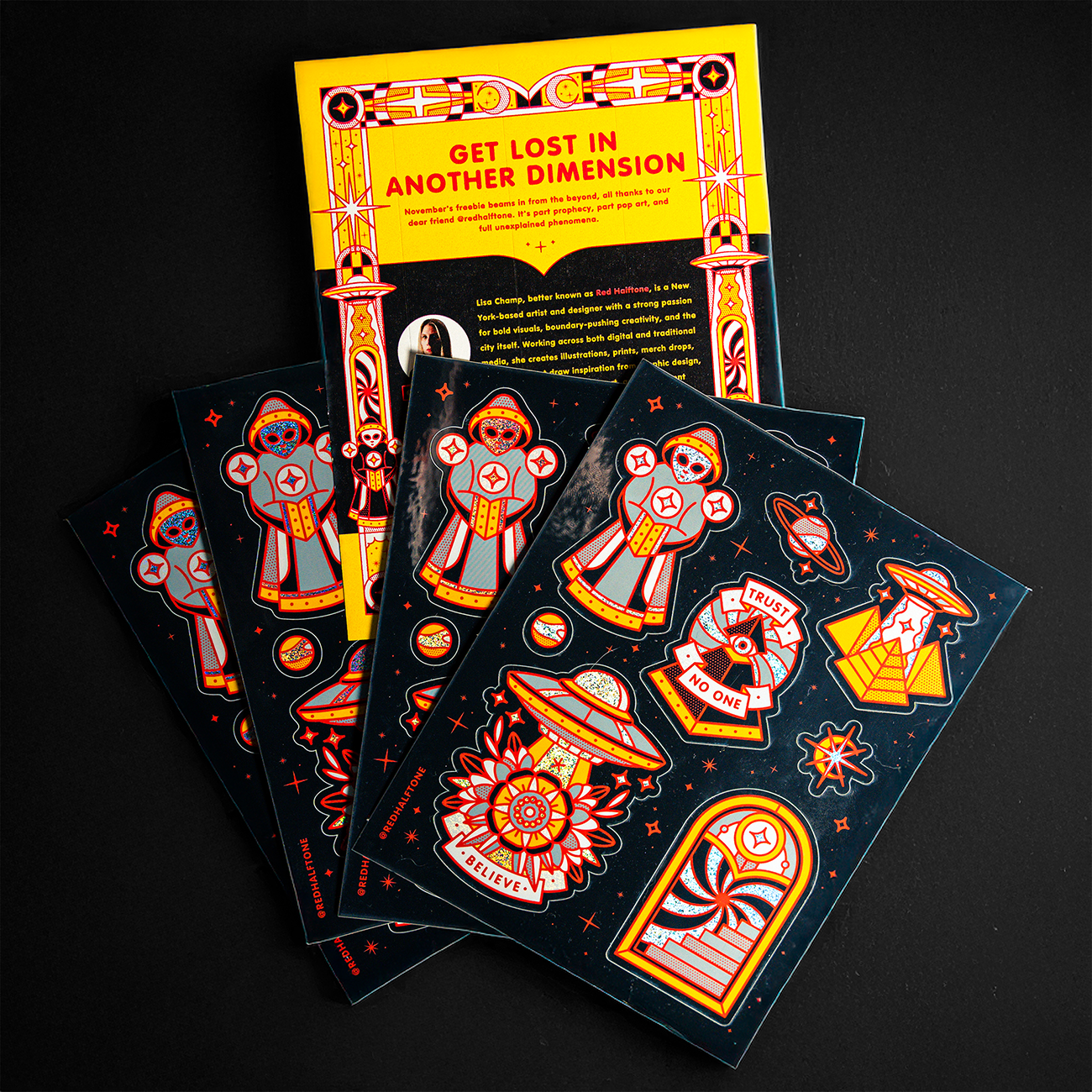 Colorful pixie dust sticker sheets with space-themed designs, including astronauts and rockets.