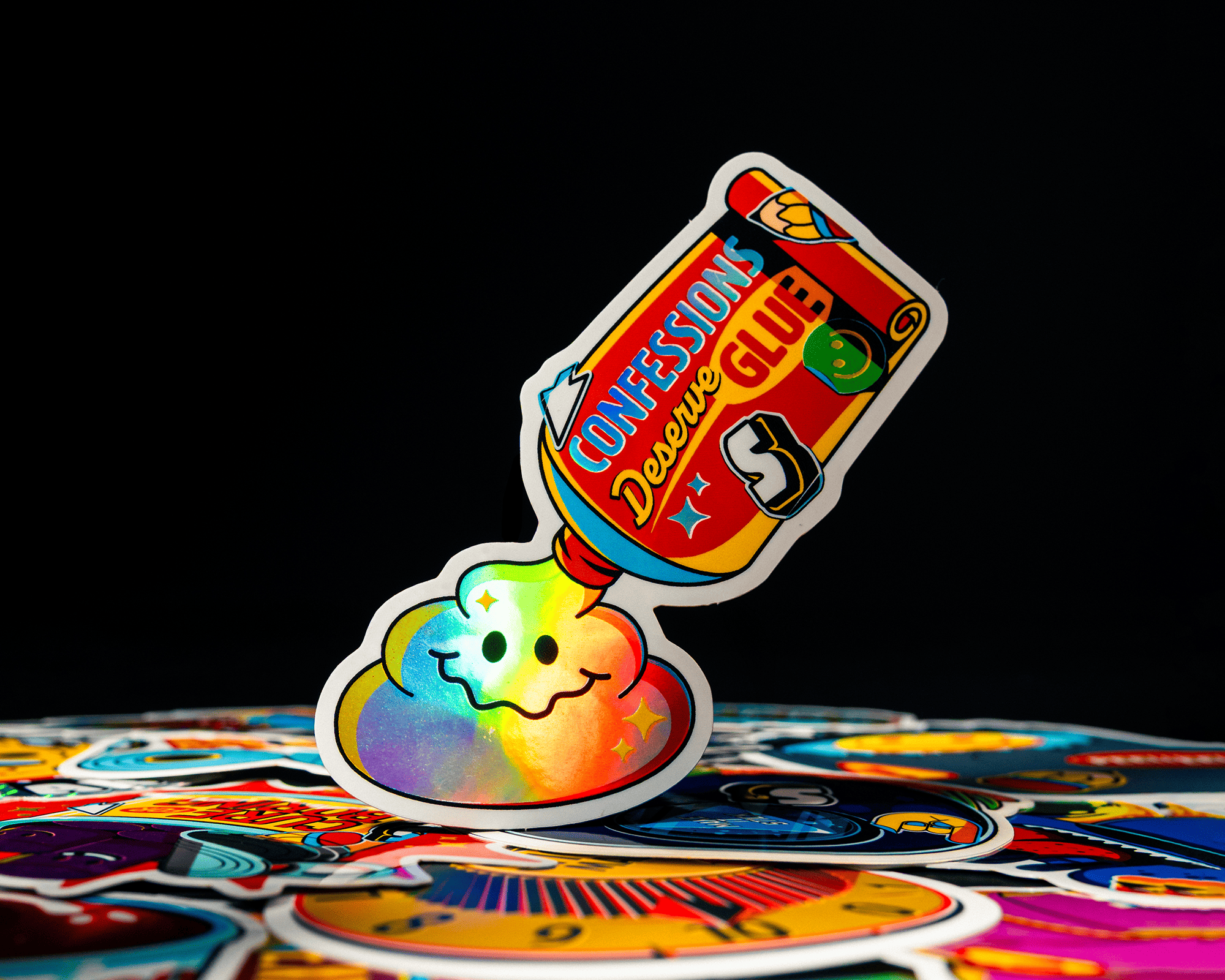 A colorful sticker. Toothpaste with the text "Confessions Deserves Glue)