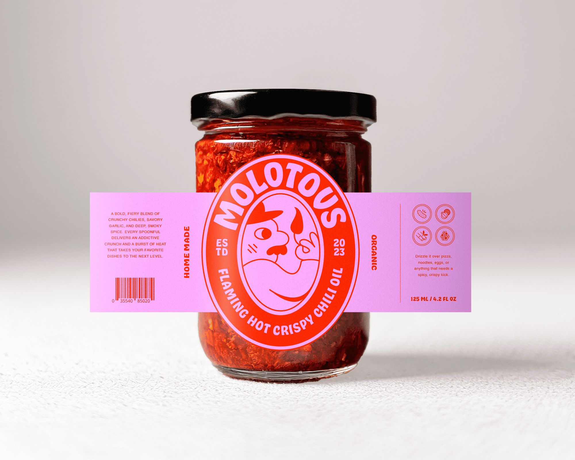 Jar of Molotous flaming hot crispy chili oil with a pink label featuring a stylized face and bold text.