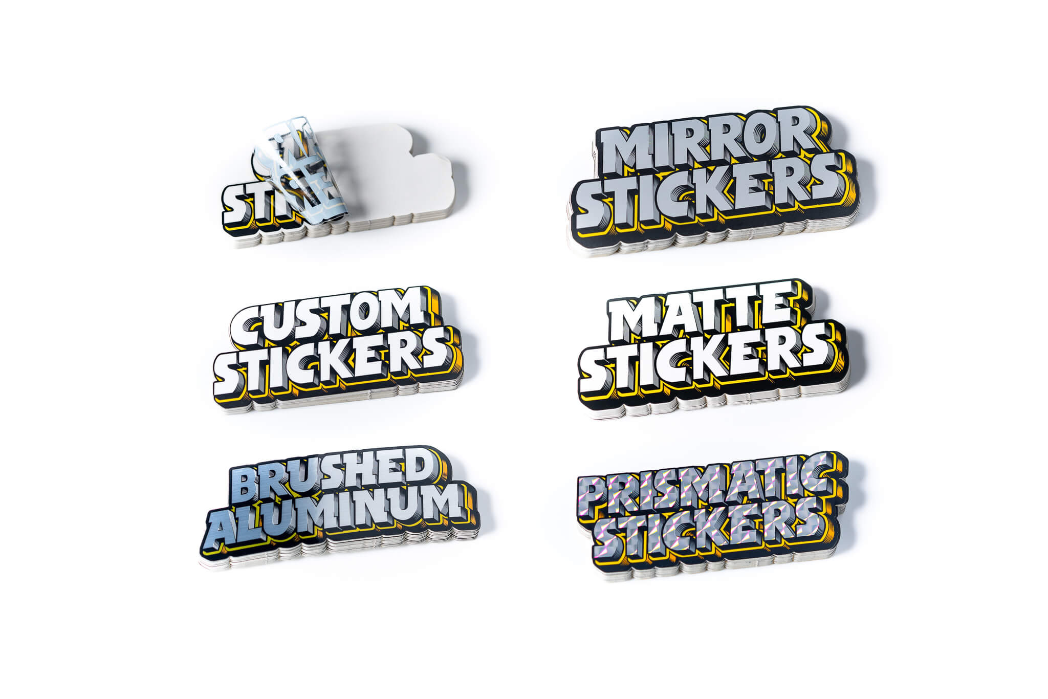 Sechs Aufkleber mit verschiedenen Texten: "Mirror Stickers", "Custom Stickers", "Matte Stickers", "Brushed Aluminum", "Prismatic Stickers".