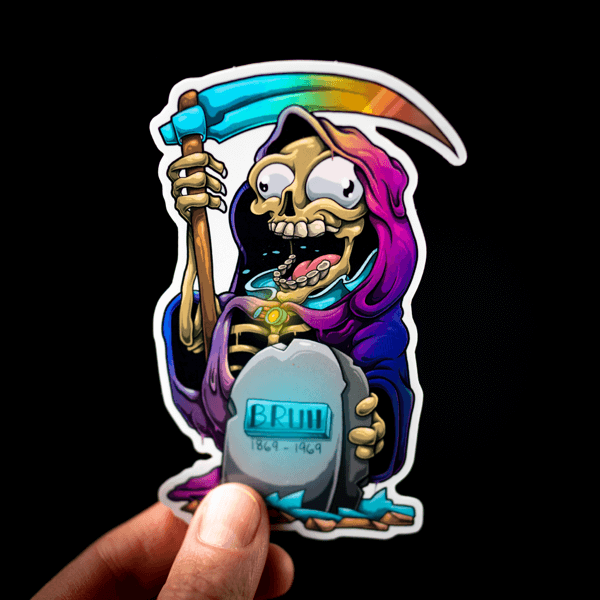 A hand holding a holographic sticker of a cartoon character